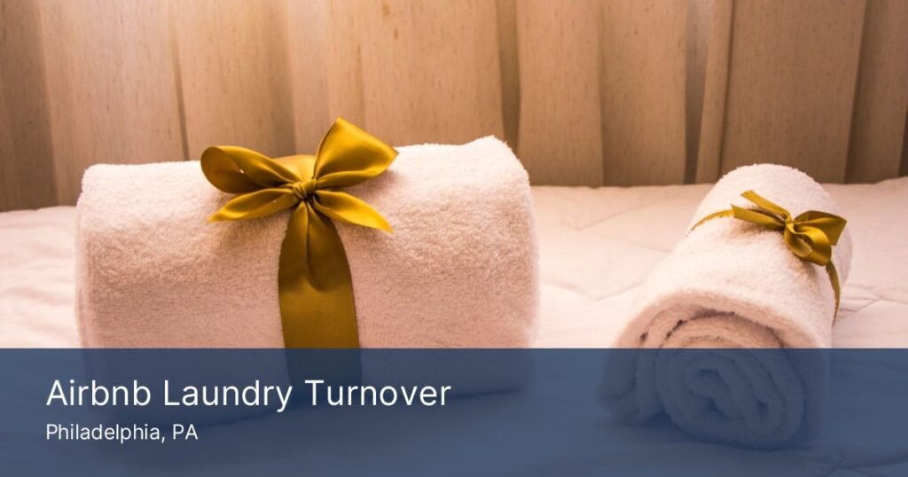 Crisp white folded towels for Airbnb laundry turnover service in Philadelphia