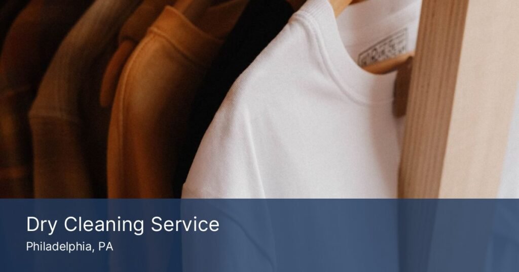Pressed garments on a rack from a professional dry cleaning service in Philadelphia